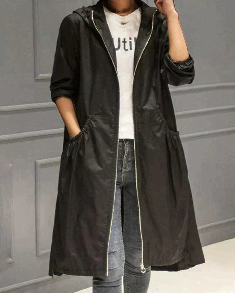 Street-wave Long Hooded Raincoat For Women Waterproof Protection And Elegant Silhouette