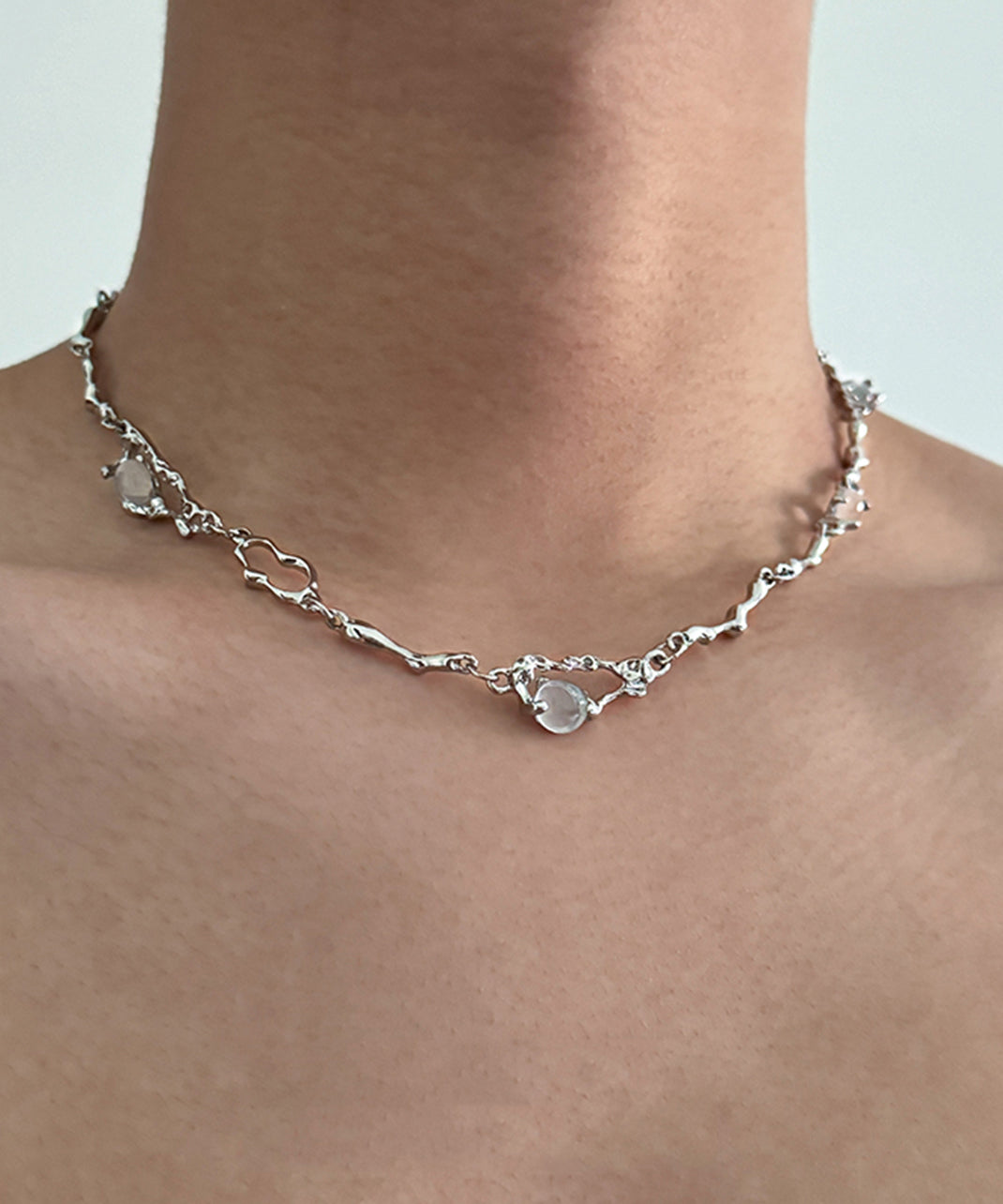 Collier avec pendentif asymétrique en acier inoxydable et pierre œil de chat Boutique Silk - Street-Wave
