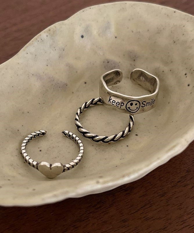 Ensemble de trois bagues en argent sterling Boutique Silk avec motif « Amour, visage souriant et torsades de pâte frite » - Street-Wave