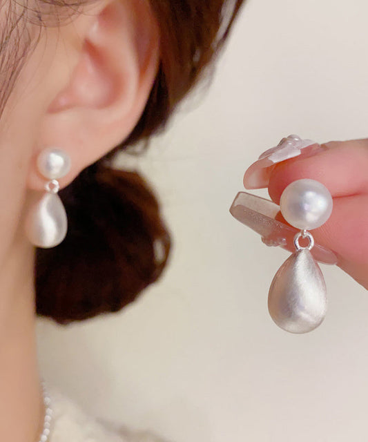 Boucles d'oreilles pendantes en or 14 carats avec perles et cuivre blanc Ovegild - Street-Wave