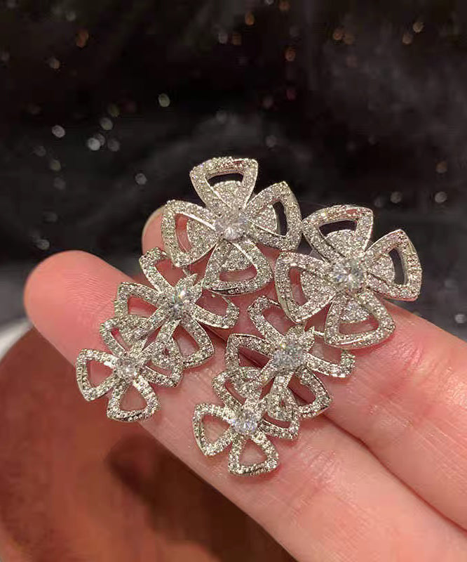 Boucles d'oreilles à tige décontractées en acier inoxydable blanc avec zircon et nœud creux - Street-Wave