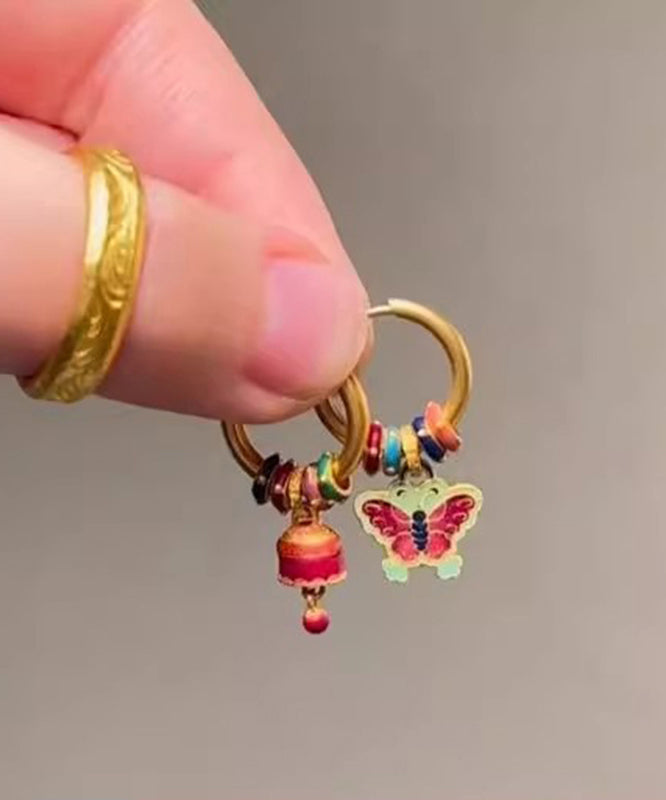 Boucles d'oreilles pendantes asymétriques en forme de cloche papillon en or antique chic - Street-Wave