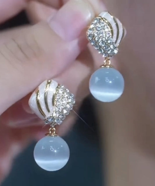 Boucles d'oreilles pendantes élégantes en alliage bleu clair avec pierre œil de chat en zircon - Street-Wave