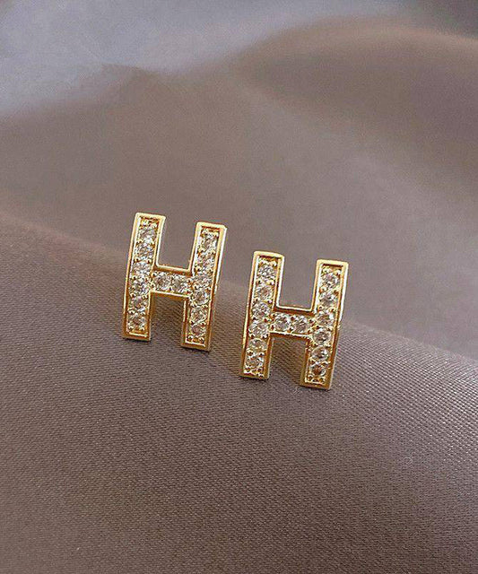 Boucles d'oreilles à tige tendance en alliage d'or et zircon avec motif graphique H - Street-Wave