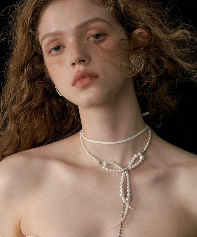 Collier à double pendentif en alliage blanc avec nœud en perles et pompon - Street-Wave