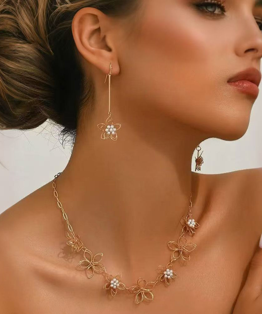 Ensemble deux pièces composé d'un collier lariat ajouré et de boucles d'oreilles pendantes en alliage de métal doré fin - Street-Wave