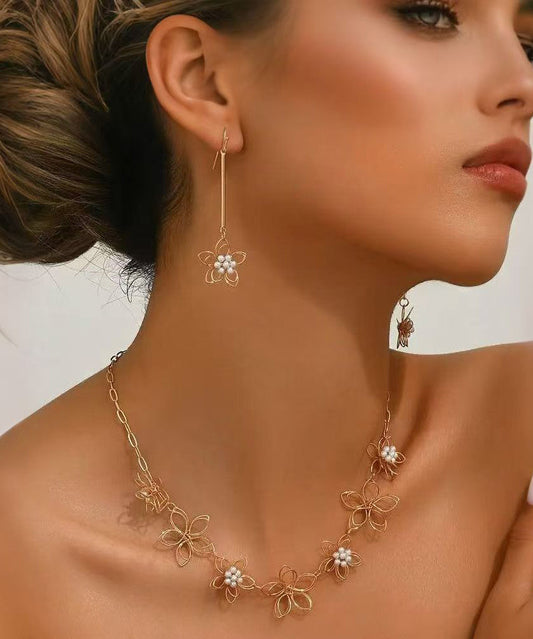 Ensemble deux pièces composé d'un collier lariat ajouré et de boucles d'oreilles pendantes en alliage de métal doré fin - Street-Wave