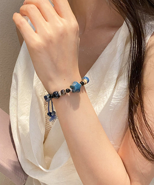 Bracelet à breloques en céramique tissée bleu roi fait main - Street-Wave