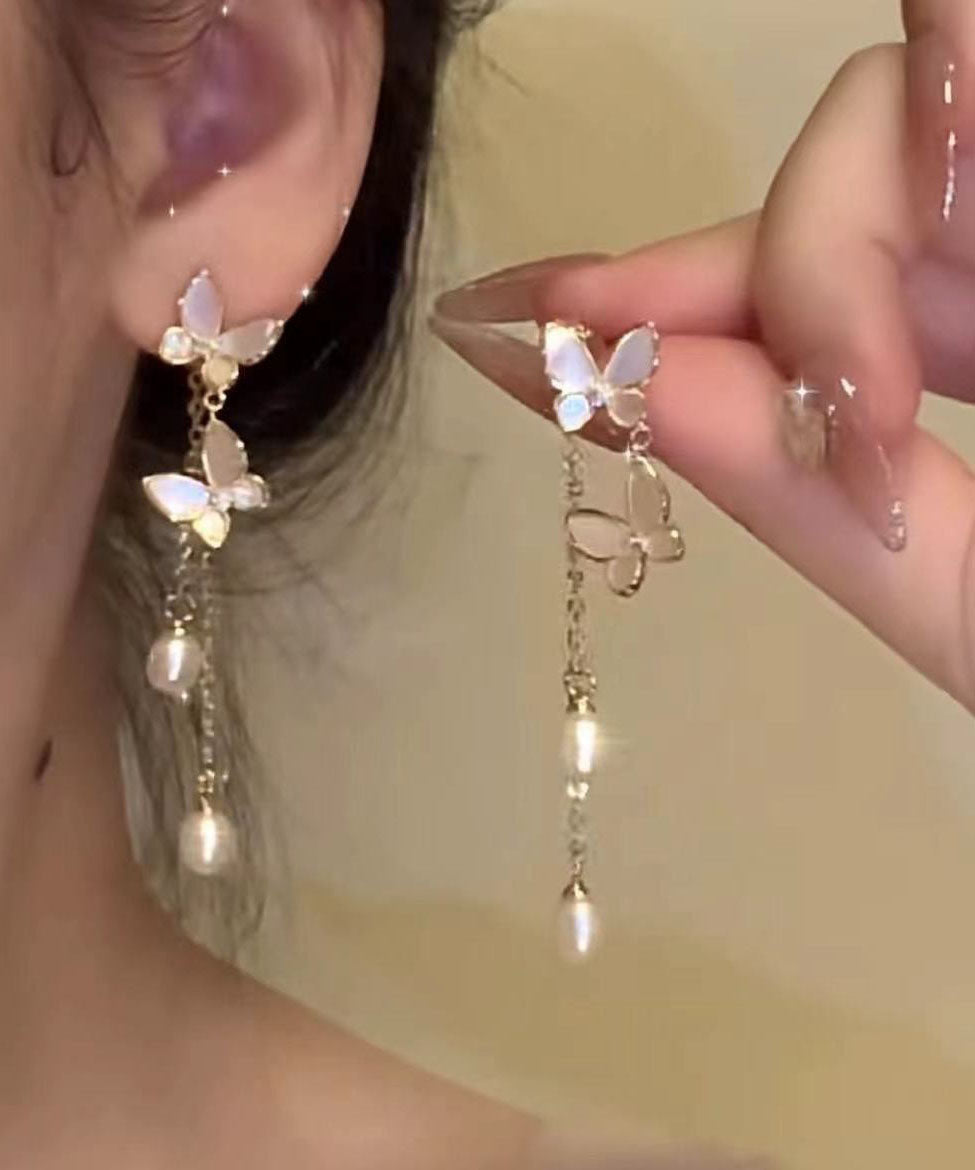 Boucles d'oreilles pendantes modernes en alliage de cuivre doré et perles, motif papillon et pompon - Street-Wave
