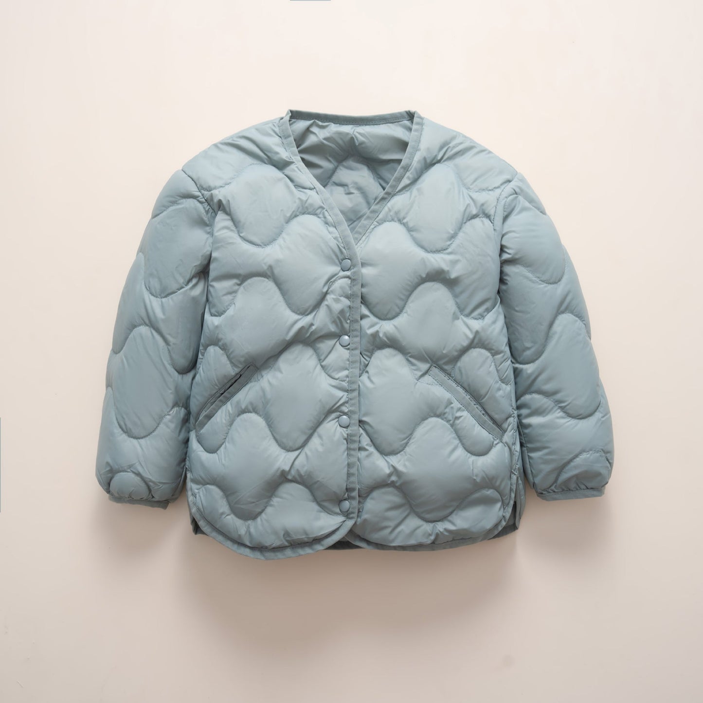 Street-Wave Womens Quilted Down Jacket With Wave Pattern For Cozy Warmth And Practical Pockets