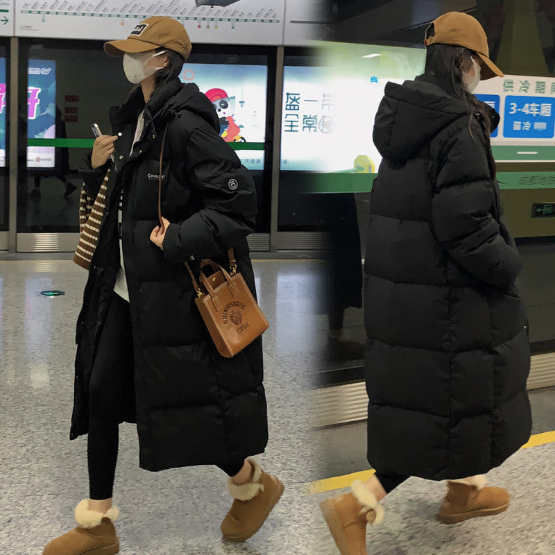 Street-Wave Women Long Puffer Coat With Hood And High Collar For Winter Warmth All-Weather Comfort