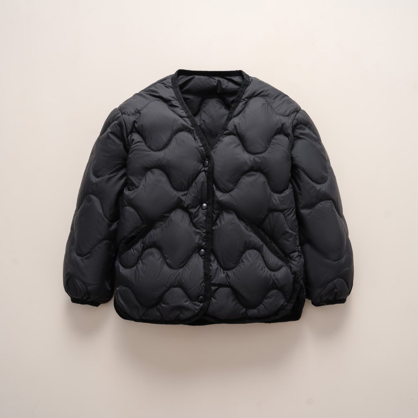 Street-Wave Womens Quilted Down Jacket With Wave Pattern For Cozy Warmth And Practical Pockets