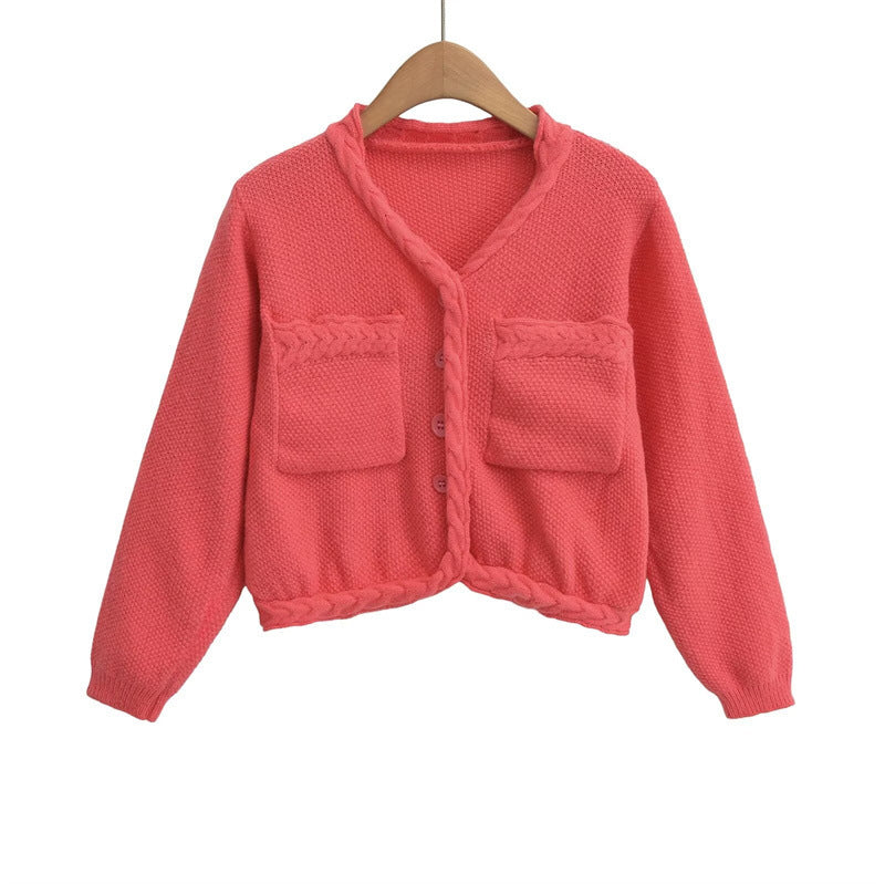 Damen Kurzstrickjacke mit geflochtenen Details und praktischen Taschen Street-wave - Street-wave