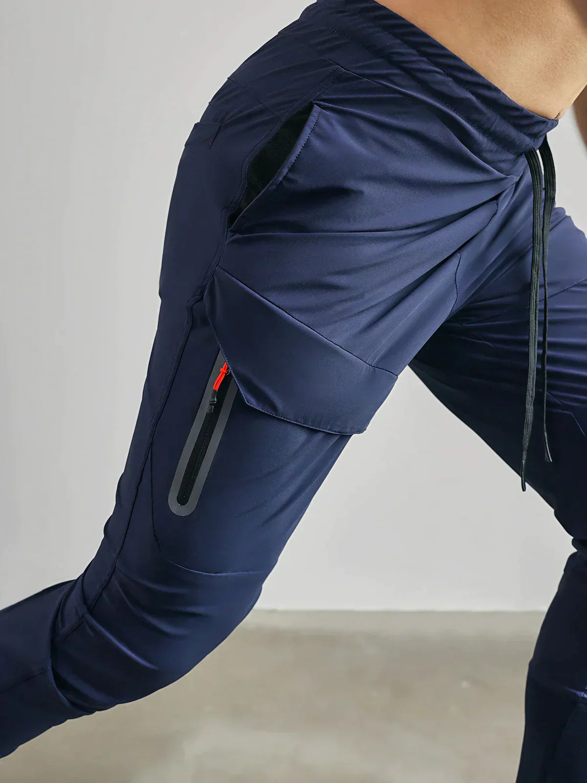 Orion Skinny Fitness Pants for Men by Street-Wave With Breathable Stretch Fabric and Zippered Pocket