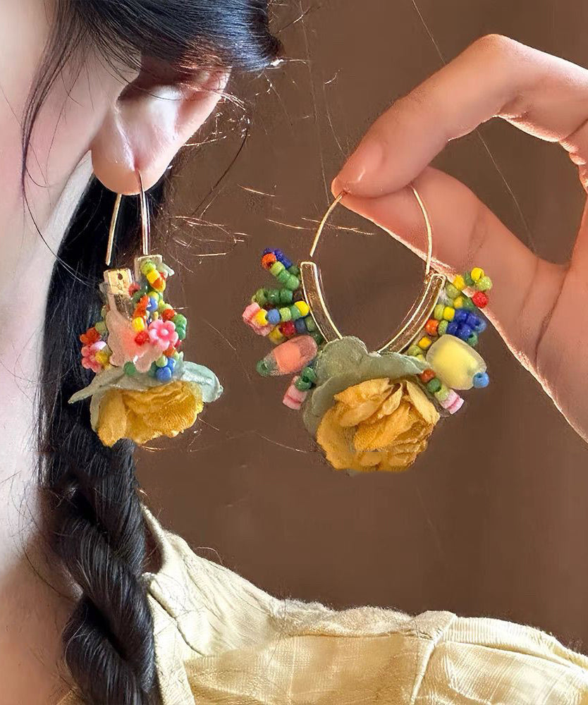 Boucles d'oreilles créoles florales en perles de tulle dorées et cuivrées au design original - Street-Wave
