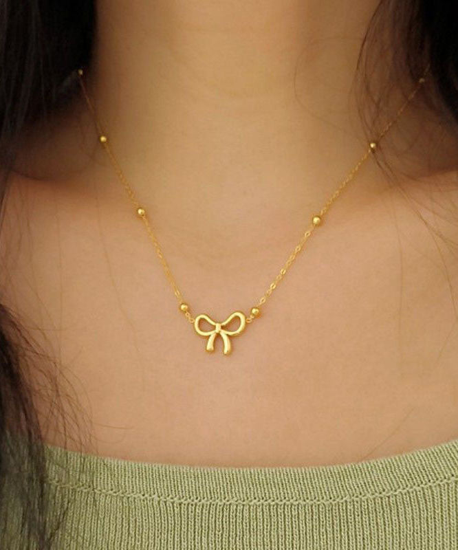 Collier élégant avec pendentif nœud en acier inoxydable doré - Street-Wave