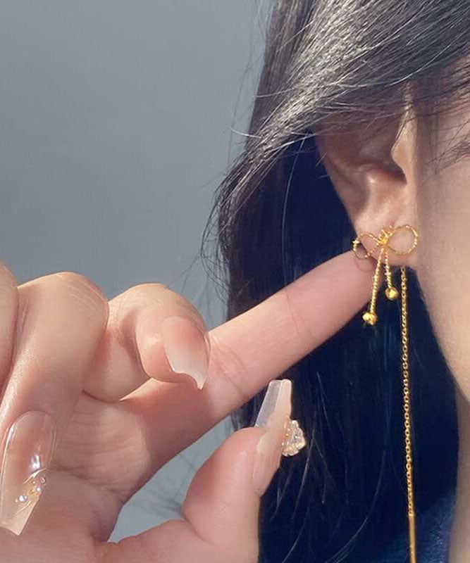 Boucles d'oreilles pendantes élégantes en argent sterling doré avec nœud - Street-Wave