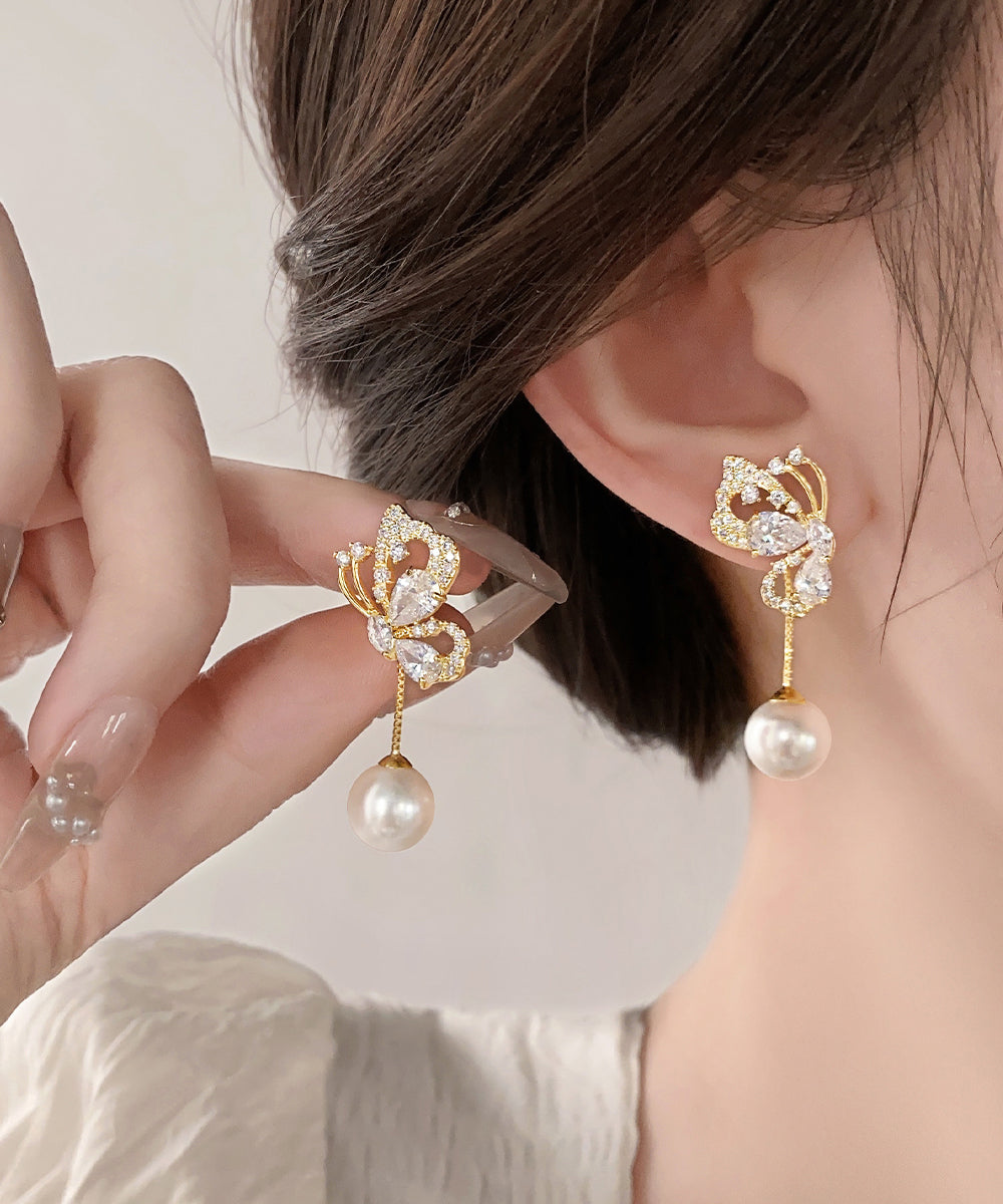 Boucles d'oreilles pendantes élégantes en argent sterling doré et zircons avec perles et papillon - Street-Wave