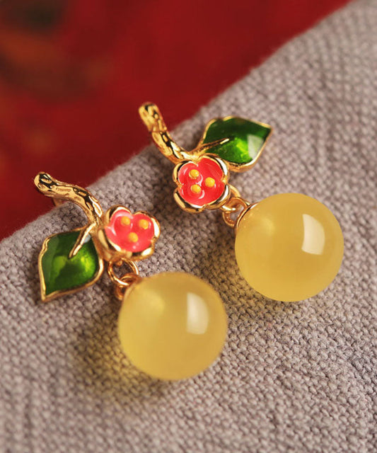 Boucles d'oreilles pendantes élégantes en argent sterling jaune, émail et cire d'abeille. - Street-Wave