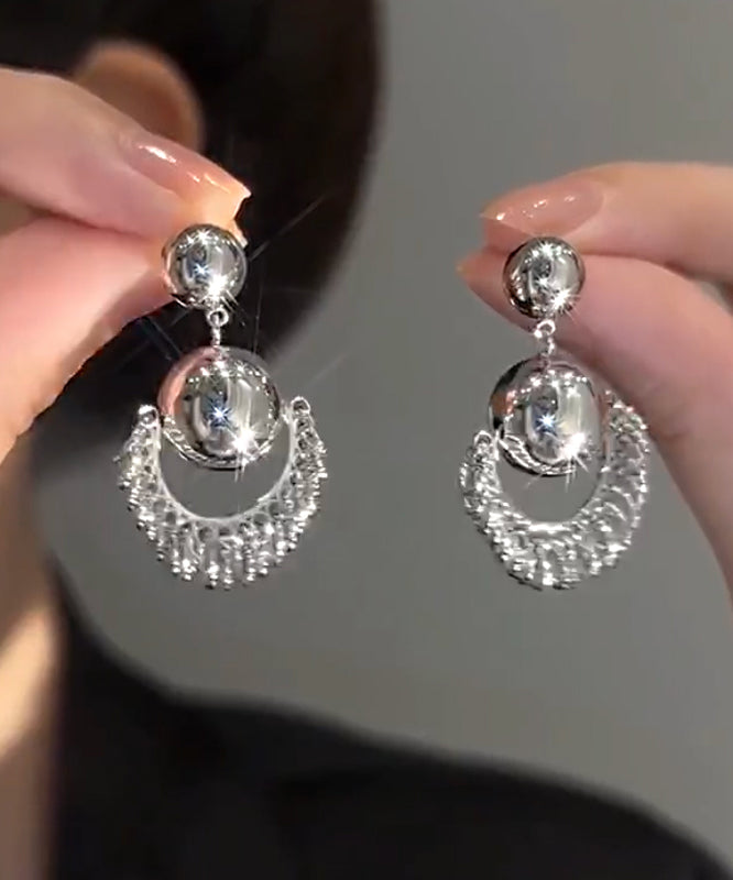 Boucles d'oreilles pendantes uniques en argent et soie Stergild - Street-Wave