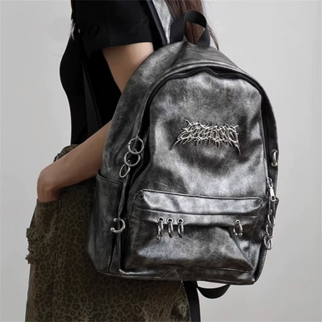 Street-Wave Rebel Chrome Backpack - Vegan Leather With Eye-Catching Metal Circles And Secure Zipper Closures