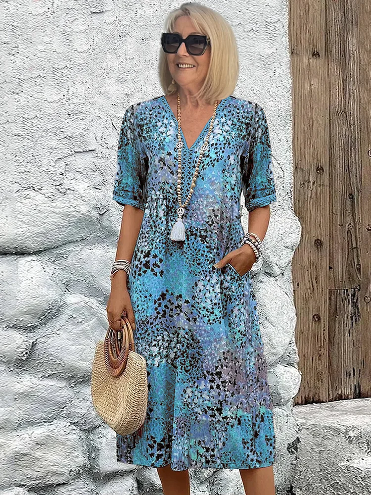 Women's Midi Dress with Vibrant Print and Flowy Design